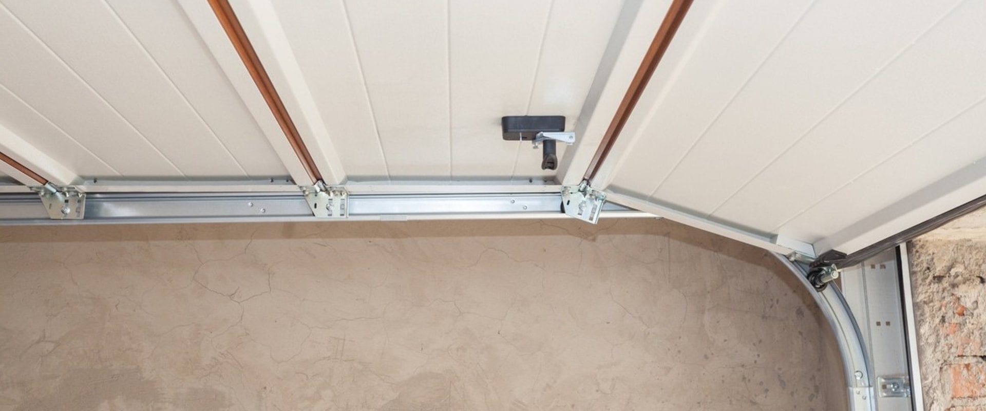 The Critical Role of Replacing Old Garage Door Tracks: Insights from Professionals